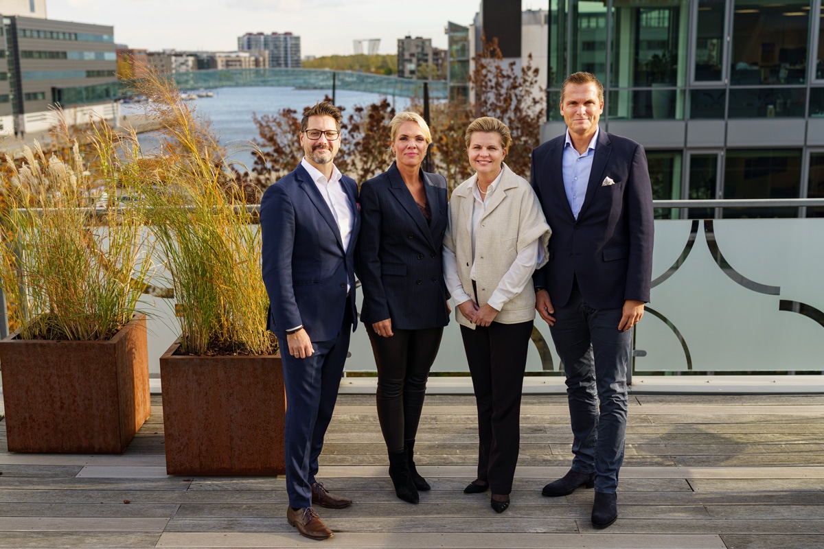 Patrick Sorrentino, Trine Holm Rasmussen, Rikke Bang, Anders Gratte with south harbour Copenhagen in the background.